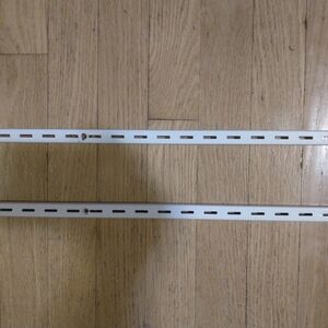 2 pcs Of 24 in. L - White Shelf Tracks Light Duty Vertical Rail, used, good cond